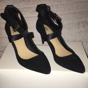 Joe’s crisscross leather strapped heels